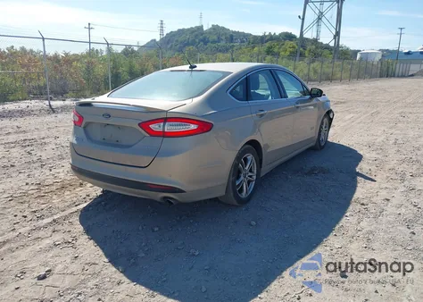 2015 Ford Fusion Energi Titanium from USA, damaged, VIN 3FA6P0SU7FR191324